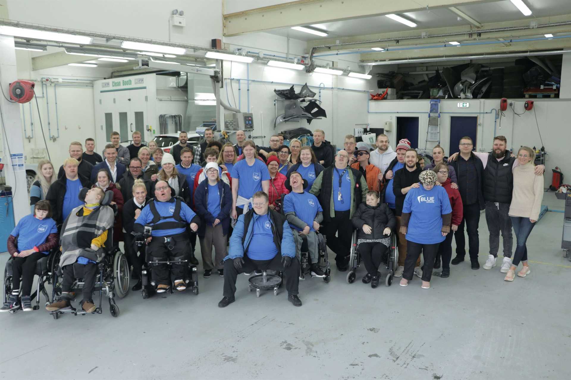 Visitors from Haefingastod with Blue Cares.