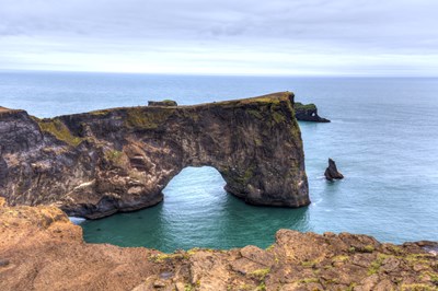  Natural rock arch formation at Dyrhólaey Peninsula on Iceland’s South Coast