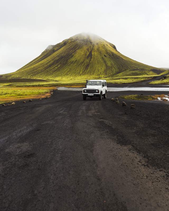 Car driving a F-road in Iceland