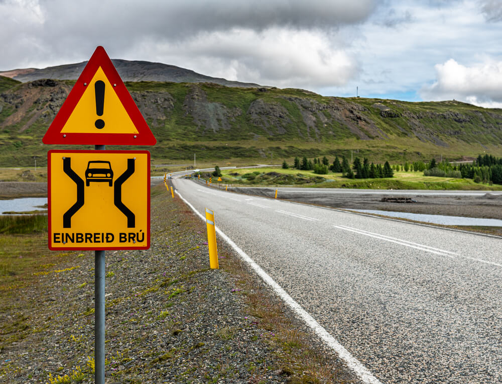 Single lane bridge road sign in Iceland.