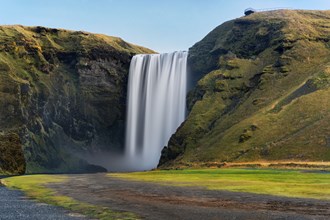 Skogafoss waterfall in Iceland in summer.