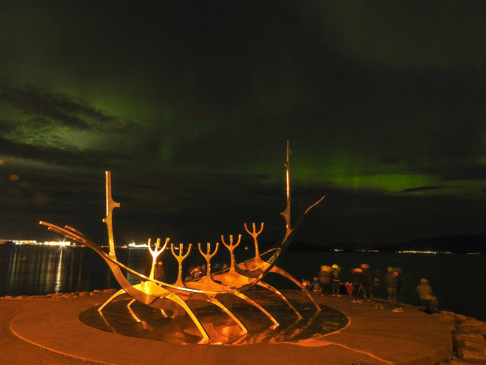 Solfar, the sun voyager under the northern lights in Reykjavik. 