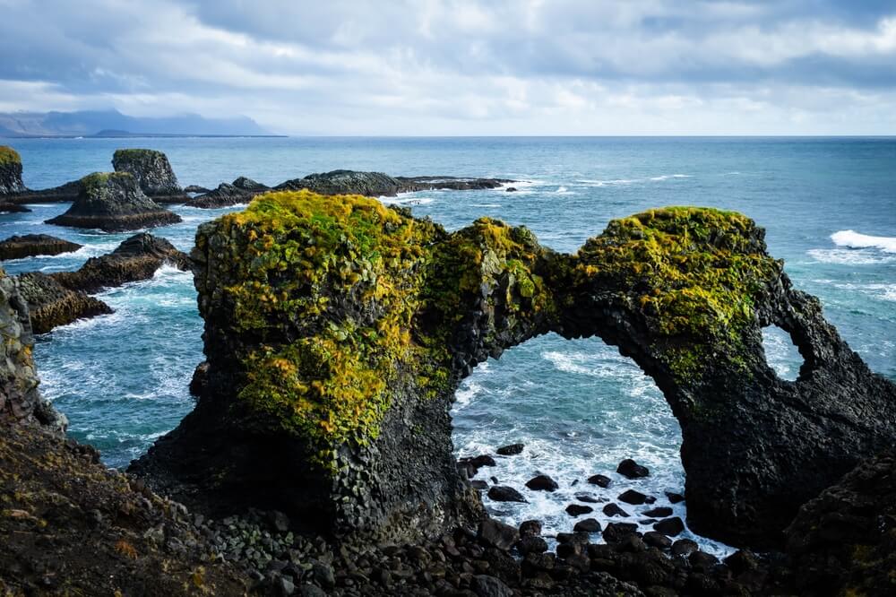 Stone arc at arnarstapi on snæfellsnes peninsula west iceland.