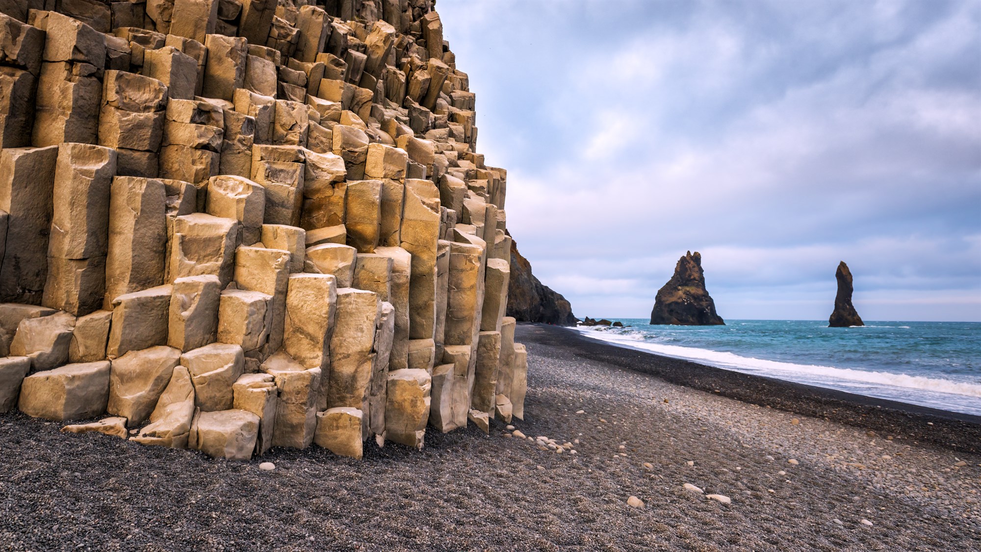 Pillar rocks at Reynisfjara black sand beach in Iceland.