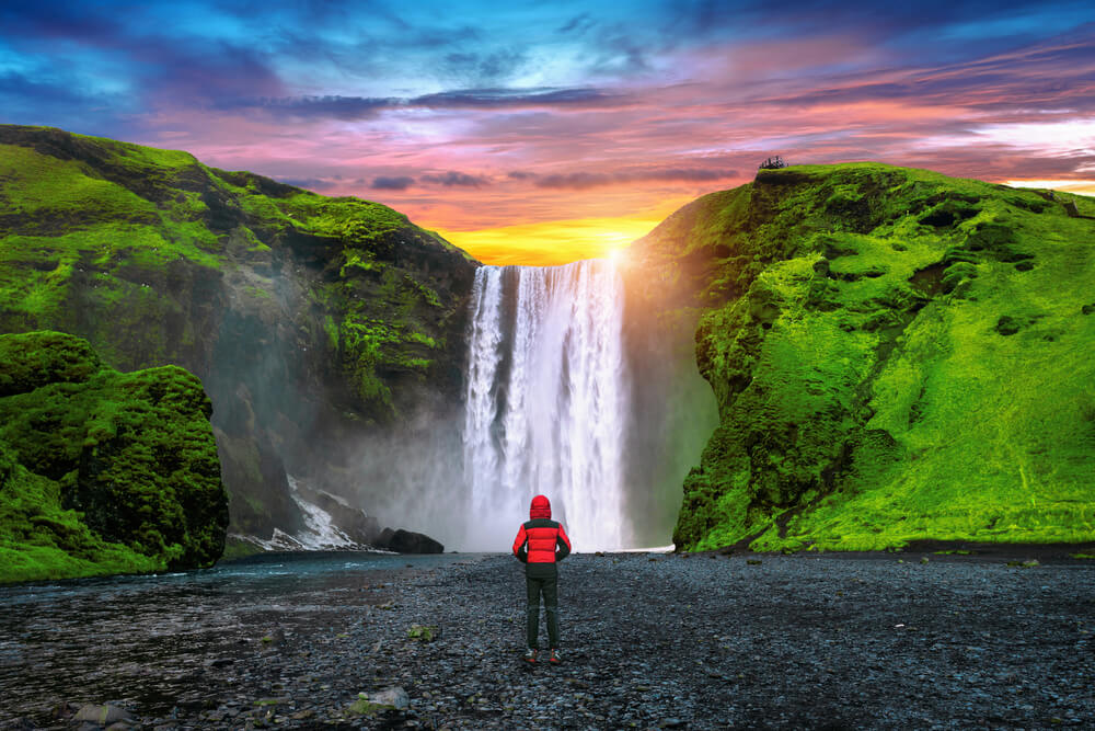 Skógafoss waterfall in the midnight sun in Iceland.