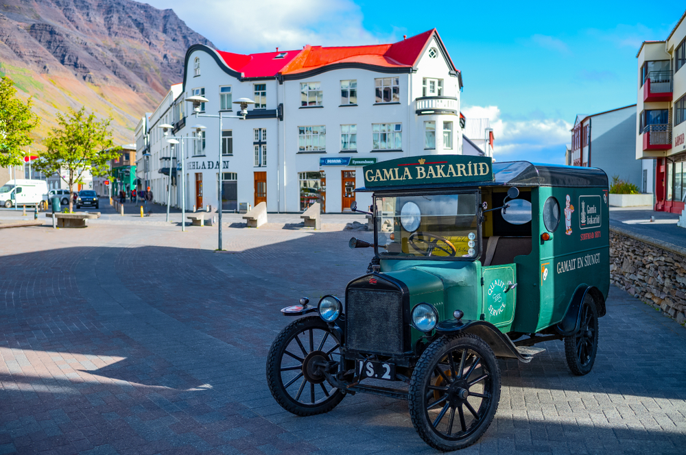 Old car in Isafjordur on a summer day in the Westfjords.